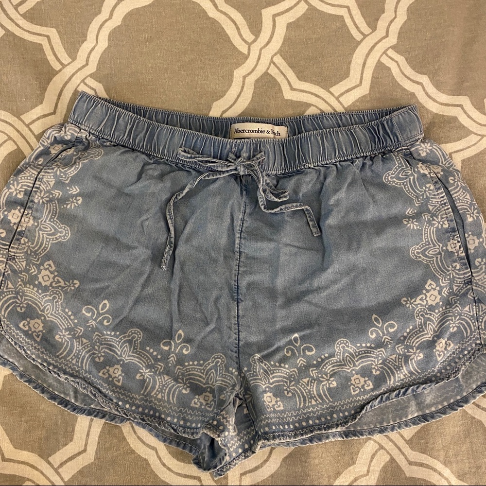 Chambray/light weight denim shorts with white embroidery